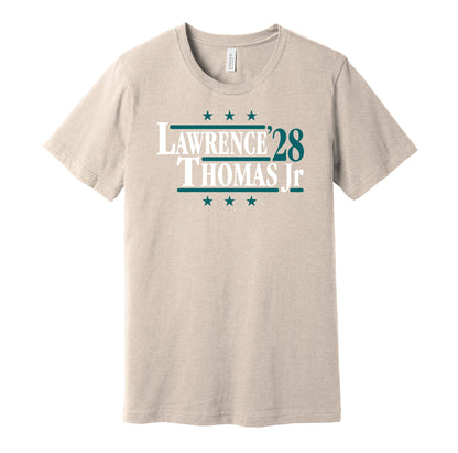 Jacksonville Jaguars retro political campaign parody tan t-shirt featuring Trevor Lawrence and Brian Thomas Jr. '28, designed in a vintage election style by Hyper Than Hype Shirts.