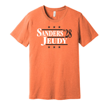Cleveland Browns retro political campaign parody orange t-shirt featuring Shedeur Sanders and Jerry Jeudy '28, designed in a vintage election style by Hyper Than Hype Shirts.