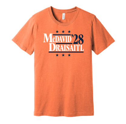 Edmonton Oilers retro political campaign parody orange t-shirt featuring Connor McDavid and Leon Draisaitl '28, designed in a vintage election style by Hyper Than Hype Shirts.