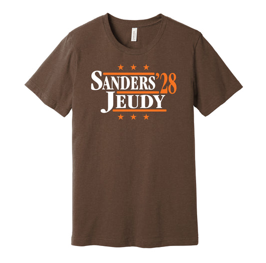 Cleveland Browns retro political campaign parody brown t-shirt featuring Shedeur Sanders and Jerry Jeudy '28, designed in a vintage election style by Hyper Than Hype Shirts.