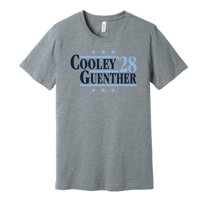 Utah Mammoth retro political campaign parody grey t-shirt featuring Logan Cooley and Dylan Guenther '28, designed in a vintage election style by Hyper Than Hype Shirts.