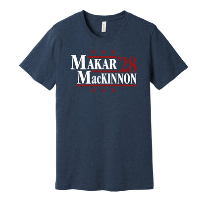 Colorado Avalanche retro political campaign parody navy t-shirt featuring Cale Makar and Nathan MacKinnon '28, designed in a vintage election style by Hyper Than Hype Shirts.