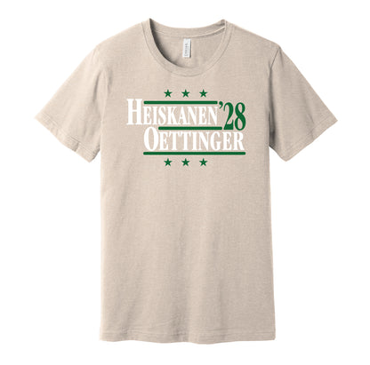 Dallas Stars retro political campaign parody sand t-shirt featuring Miro Heiskanen and Jake Oettinger '28, designed in a vintage election style by Hyper Than Hype Shirts.