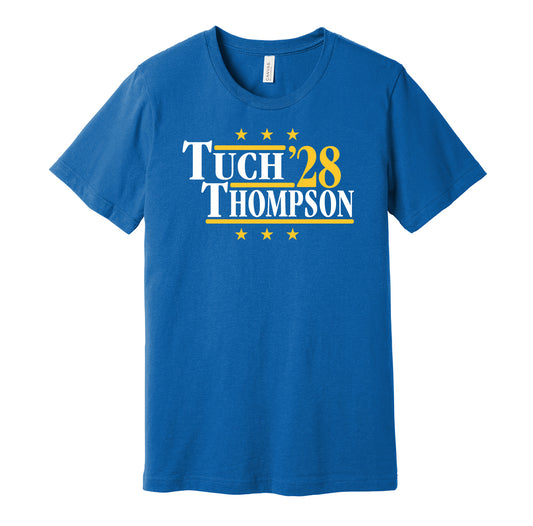 Buffalo Sabres retro political campaign parody blue t-shirt featuring Tage Thompson and Alex Tuch '28, designed in a vintage election style by Hyper Than Hype Shirts.