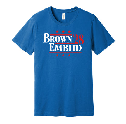 Philadelphia 76ers retro political campaign parody blue t-shirt featuring Jaylen Brown and Joel Embiid '28, designed in a vintage election style by Hyper Than Hype Shirts.