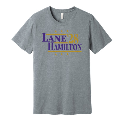 Baltimore Ravens retro political campaign parody grey t-shirt featuring Ja'Kobi Lane and Kyle Hamilton '28, designed in a vintage election style by Hyper Than Hype Shirts.