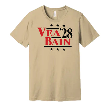 Tampa Bay Buccaneers retro political campaign parody tan t-shirt featuring Vita Vea and Rueben Bain Jr. '28, designed in a vintage election style by Hyper Than Hype Shirts.