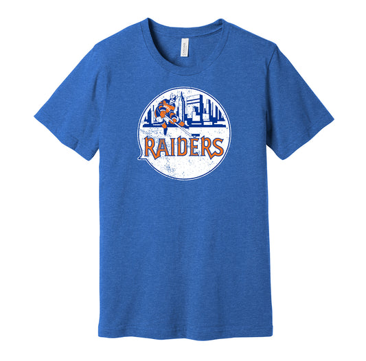 New York Raiders vintage distressed logo blue t-shirt featuring the classic 1970s WHA hockey team logo in a retro worn style by Hyper Than Hype Shirts.