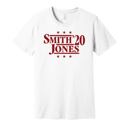 Alabama Crimson Tide retro political campaign parody white t-shirt featuring DeVonta Smith and Mac Jones '20, designed in a vintage election style by Hyper Than Hype Shirts.
