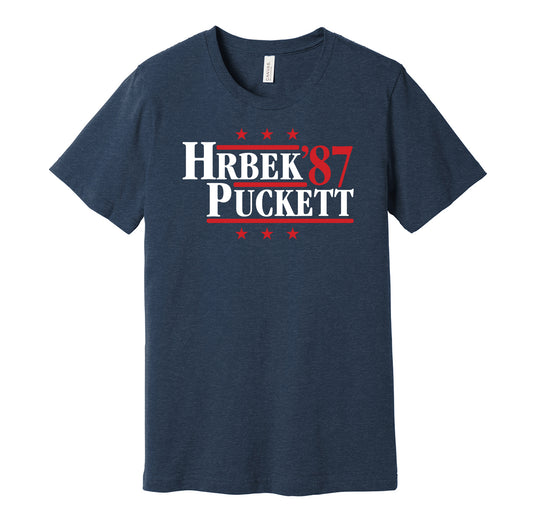 Minnesota Twins retro political campaign parody navy t-shirt featuring Kent Hrbek and Kirby Puckett '87, designed in a vintage election style by Hyper Than Hype Shirts.