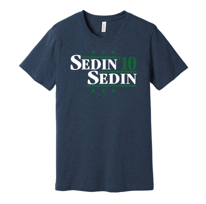 Vancouver Canucks retro political campaign parody blue t-shirt featuring Henrik Sedin and Daniel Sedin '10, designed in a vintage election style by Hyper Than Hype Shirts.